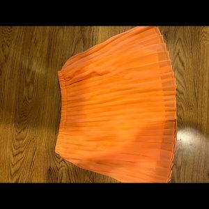 Neon orange skirt